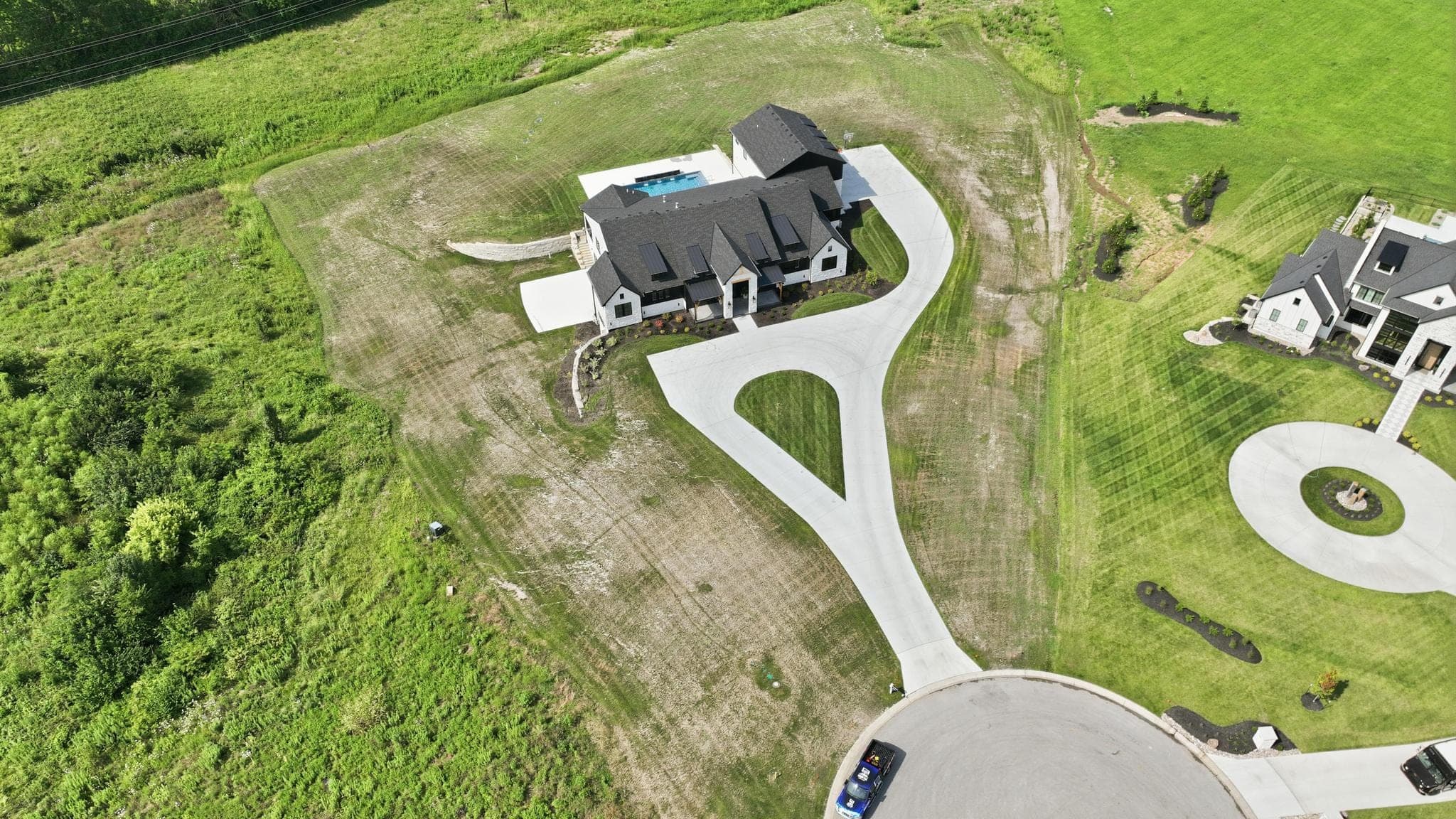 Aerial of the drive and lot from the road side