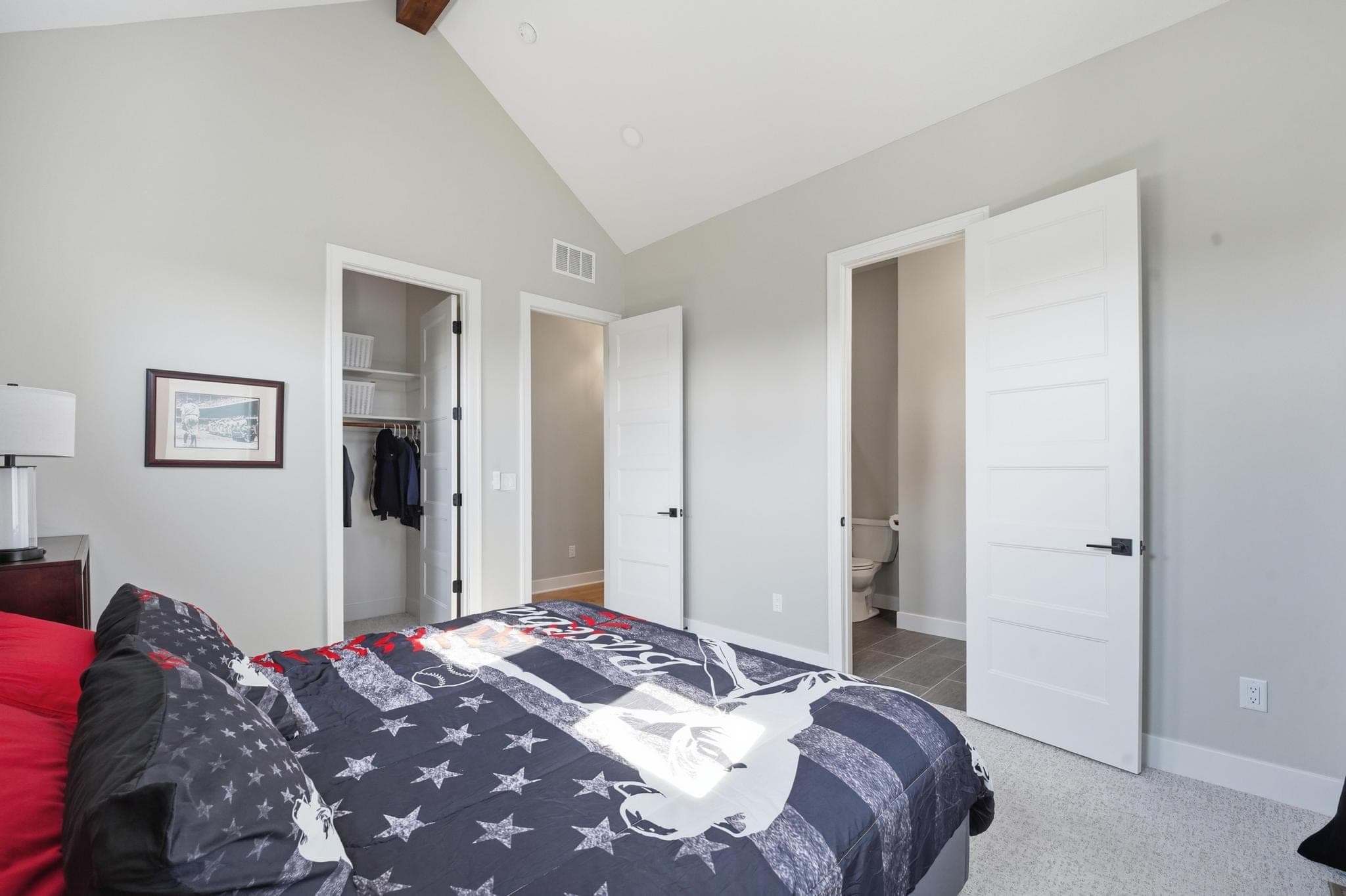 Bedroom looking toward the ensuite and closet