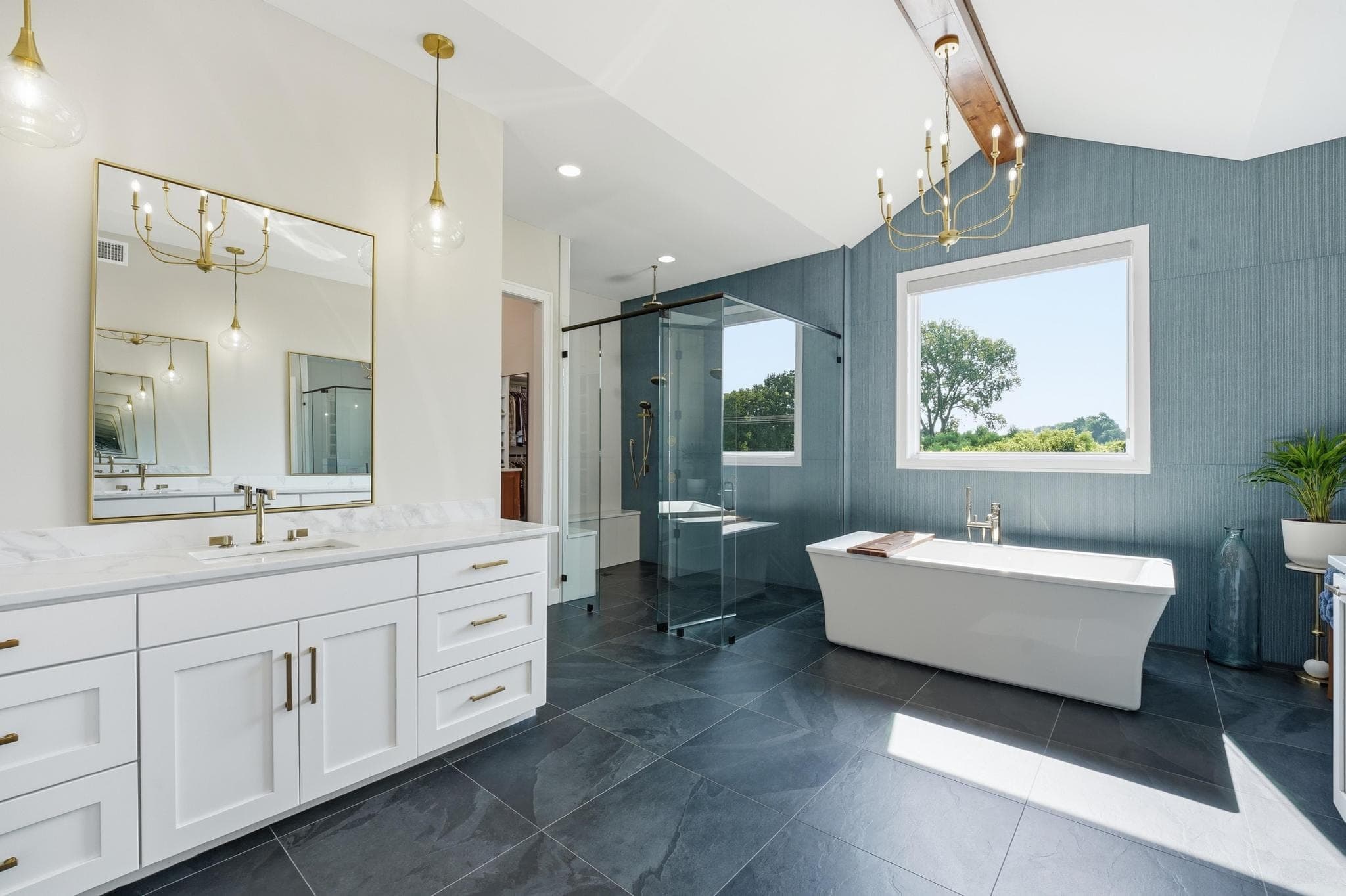 Primary bath vanity and glass shower