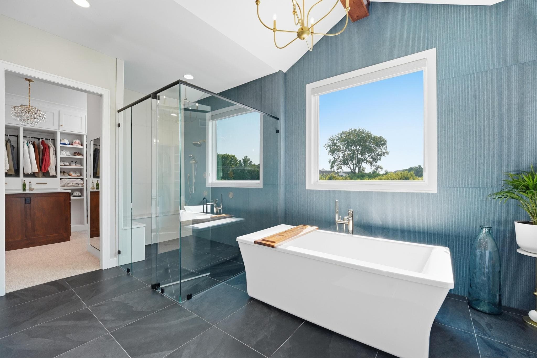 Soaking tub beside the glass shower