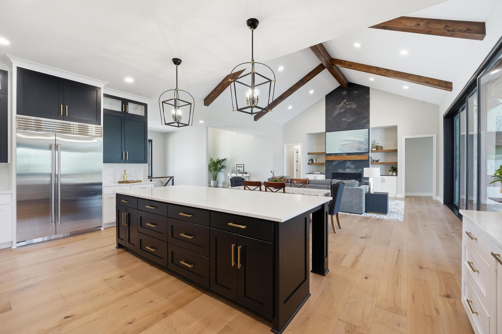 Kitchen island with seating looking toward the living room