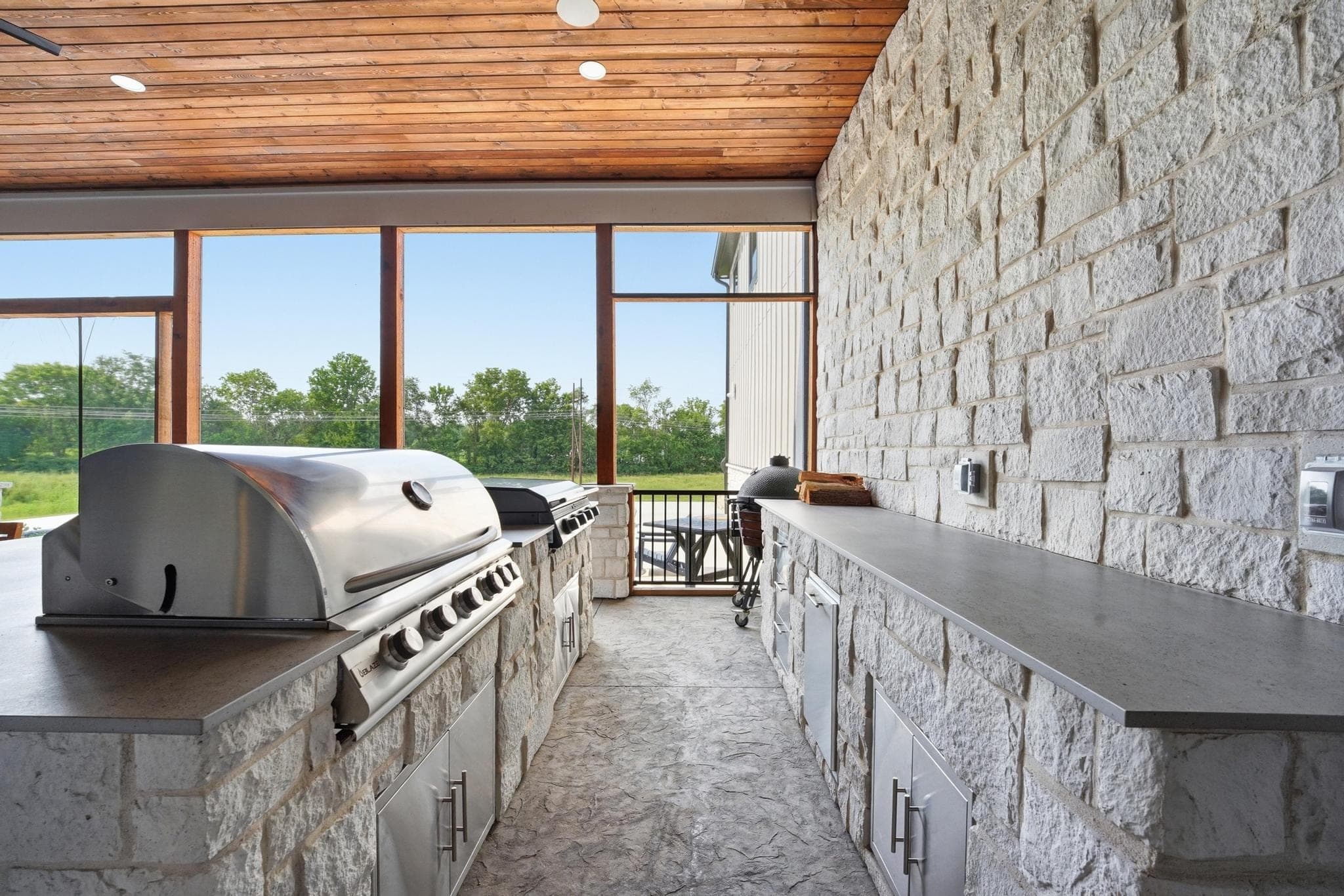 Built-in grill on the stone outdoor kitchen island