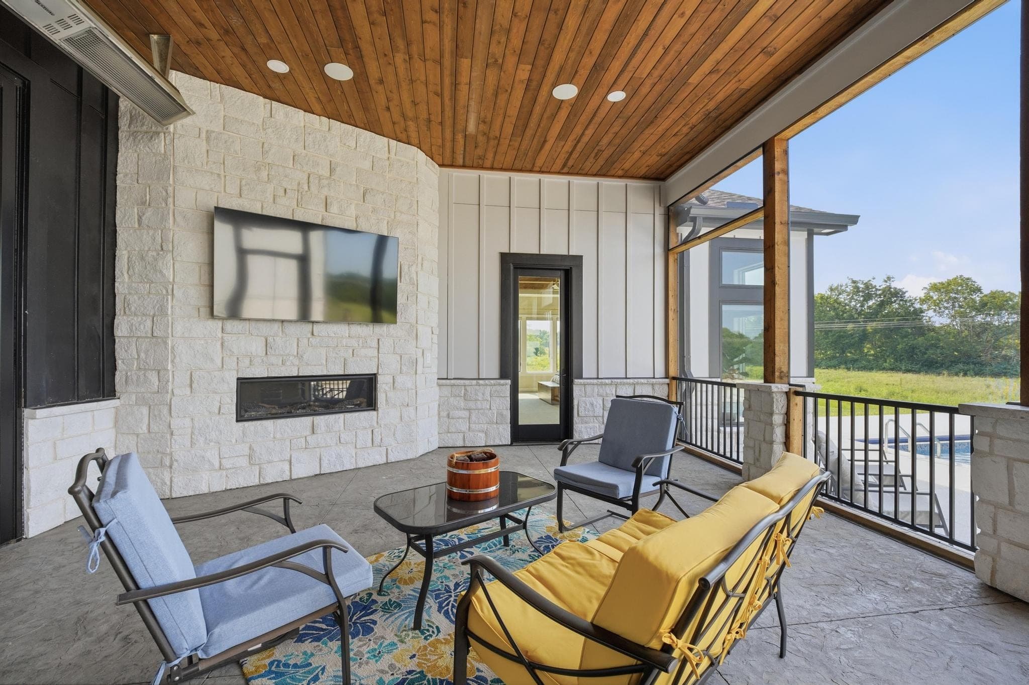 Patio lounge seating by the outdoor fireplace