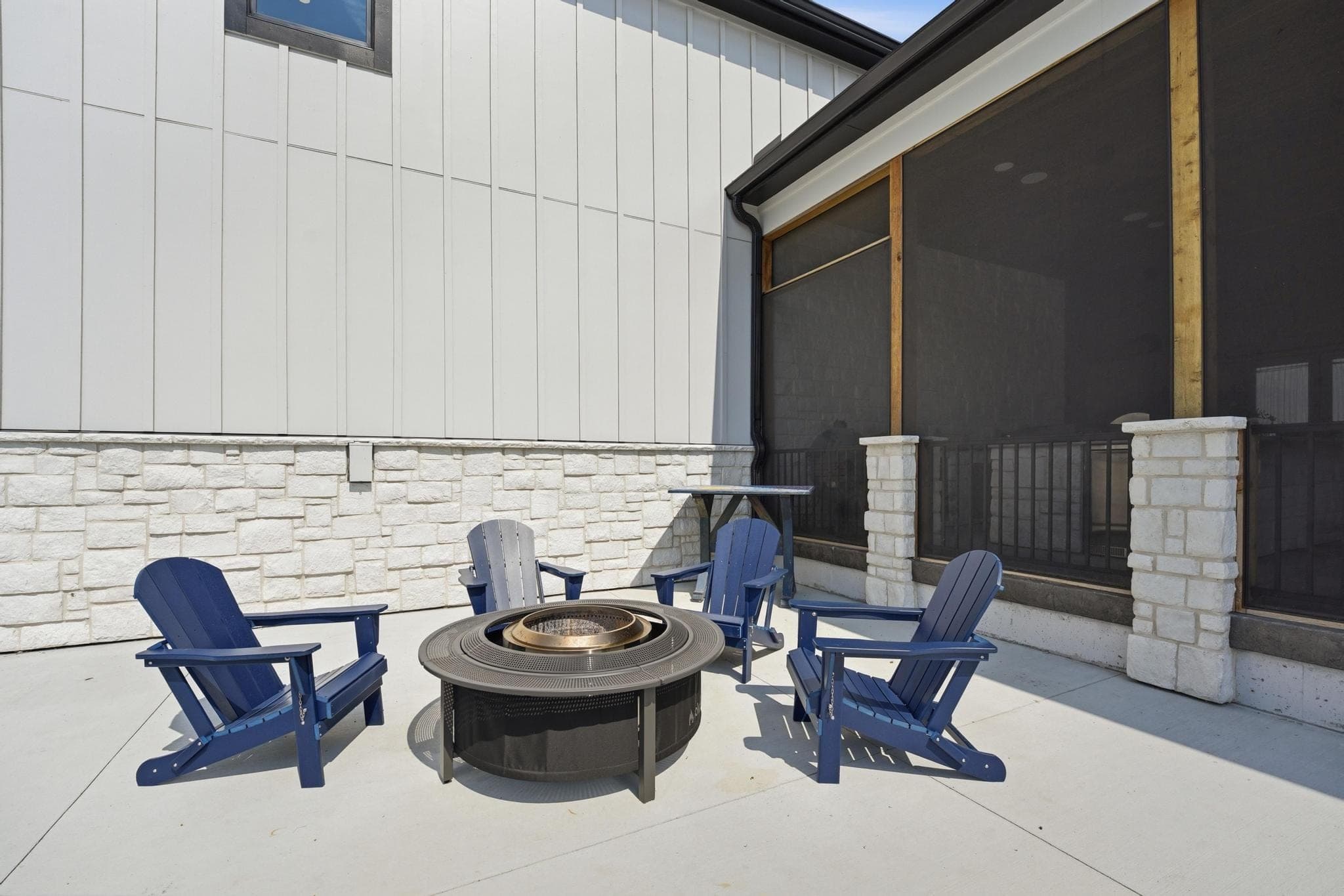 Fire pit with Adirondack chairs