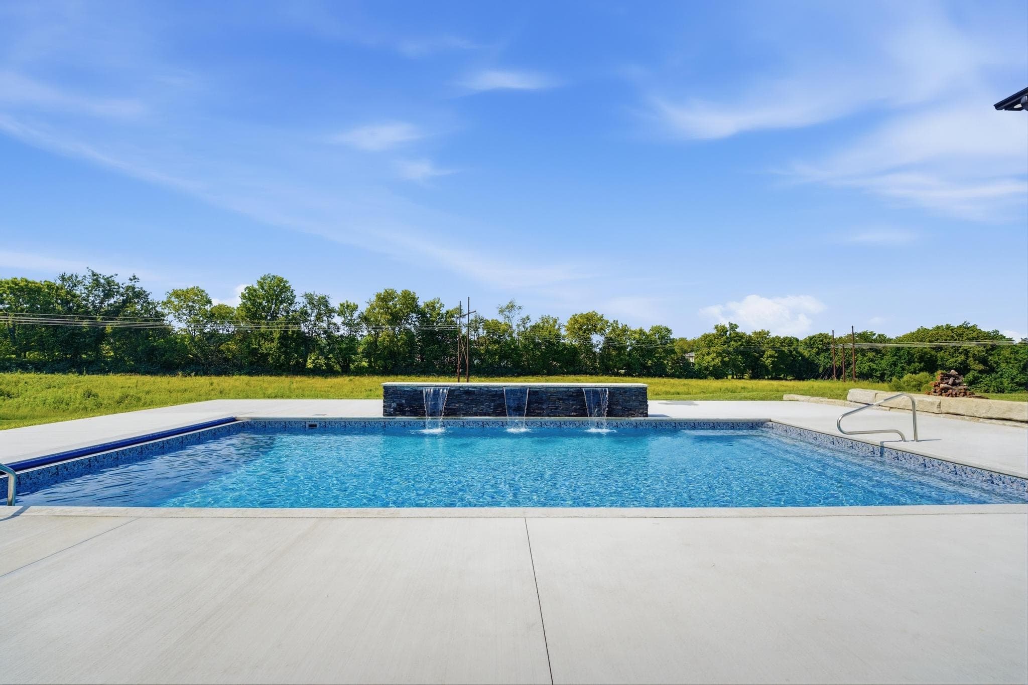 Wide view of the pool and surround