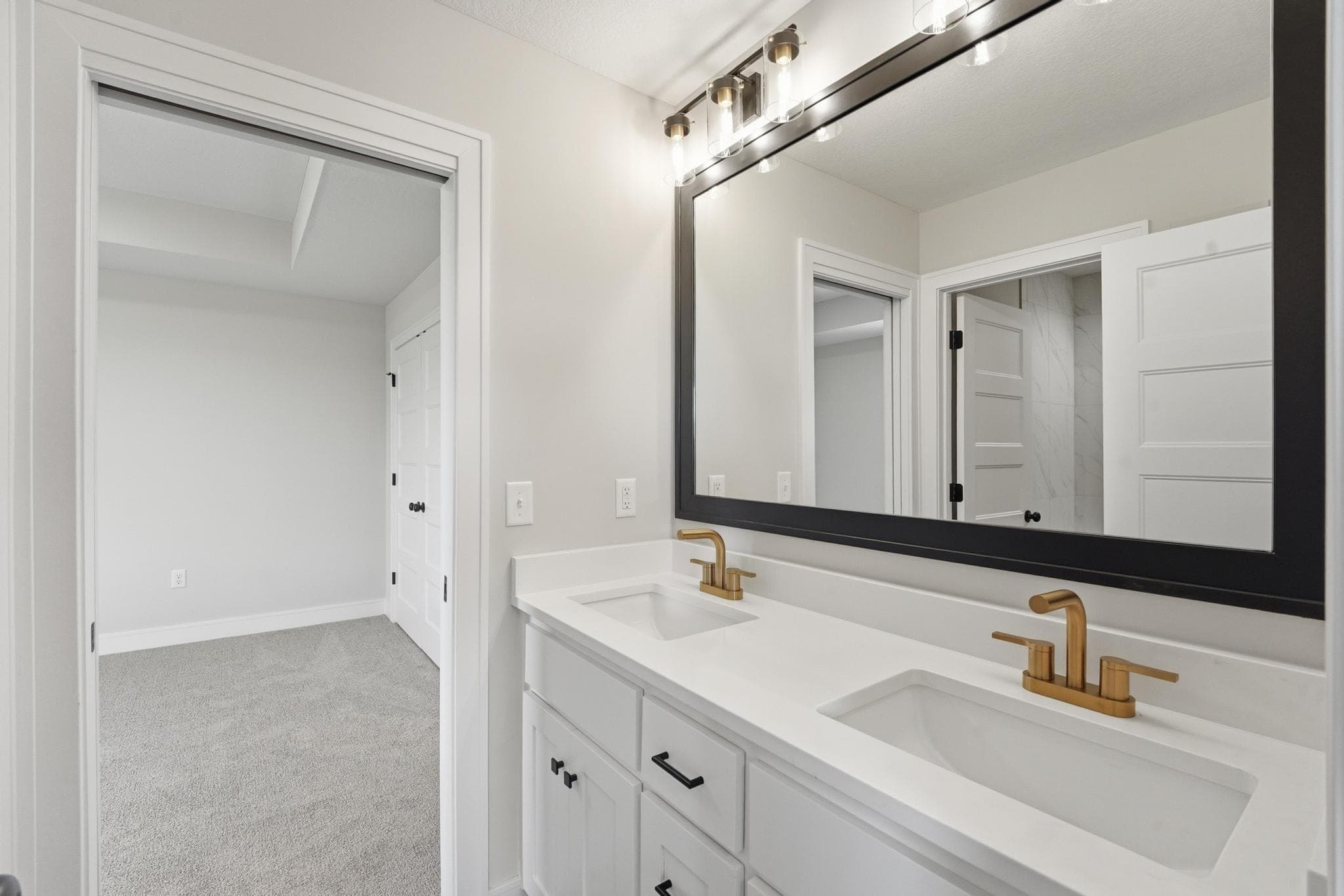 Hall bath with white vanity