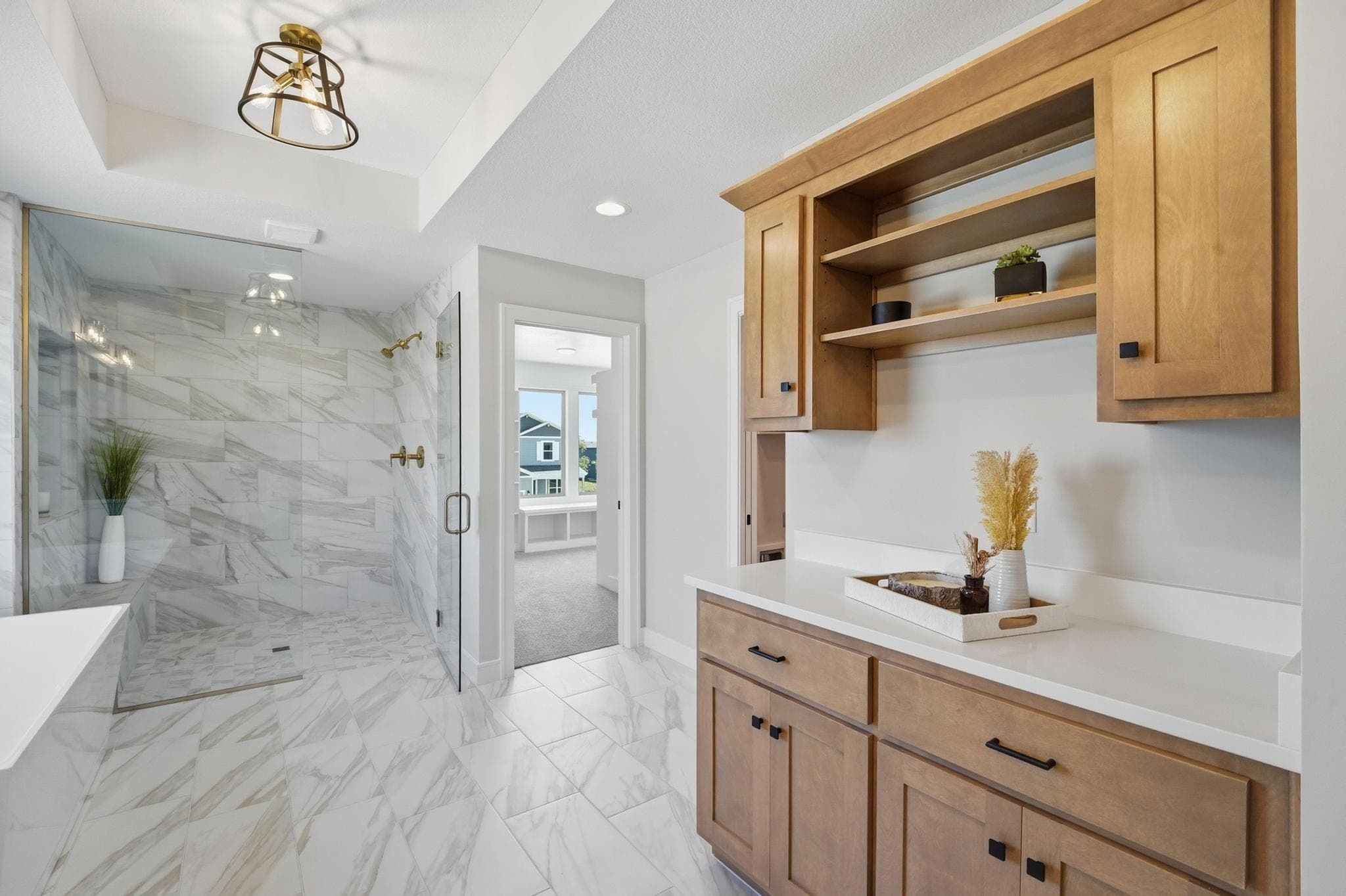 Primary bath vanity with wood shelving