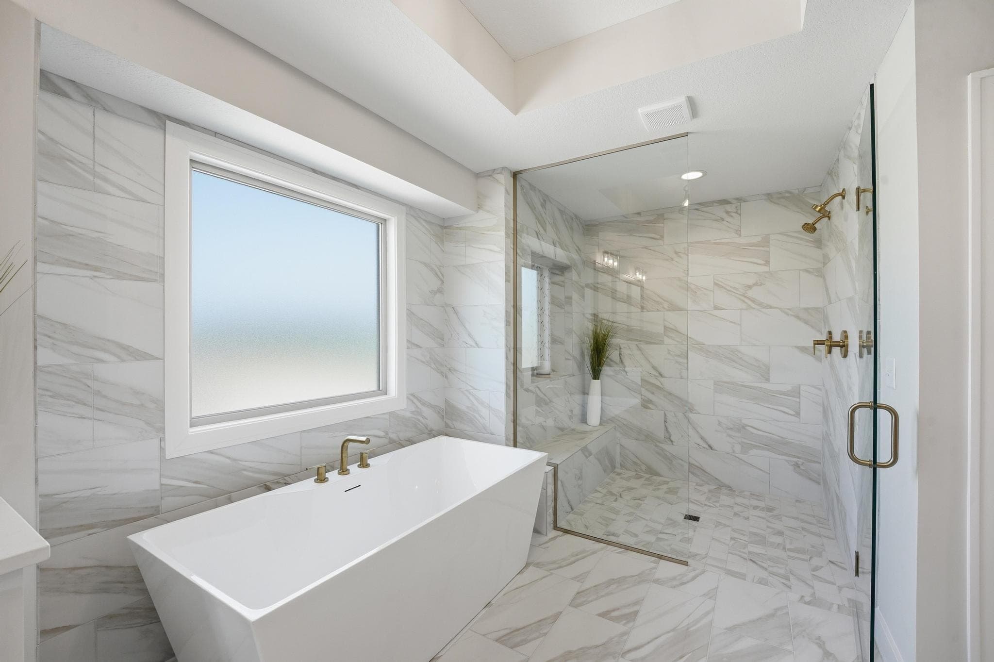 Freestanding tub and glass shower