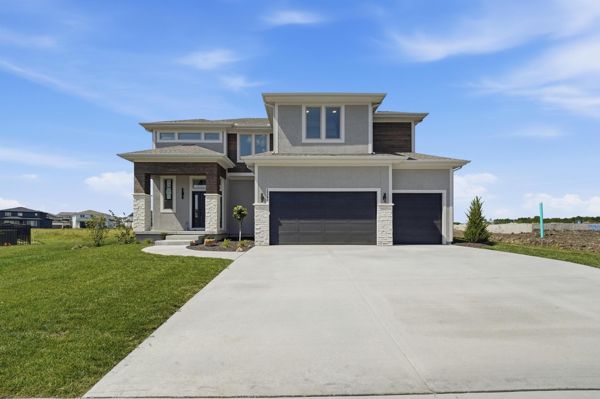 Front elevation from the side of the drive